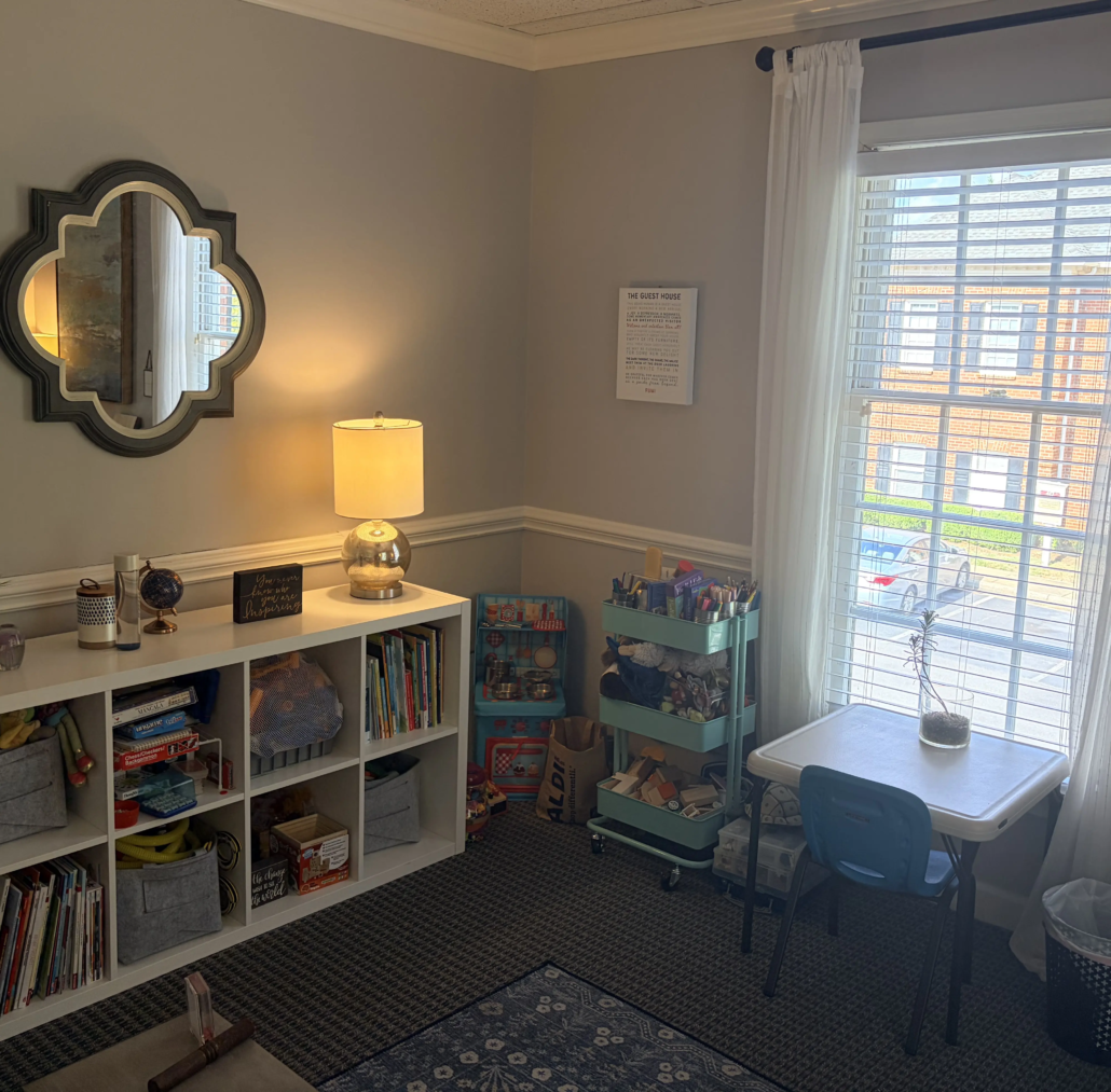 Amanda's Play Therapy Room Charlotte NC Play therapy room in Charlotte, NC with comfortable seating, toys, books, and soft lighting for children's therapy sessions